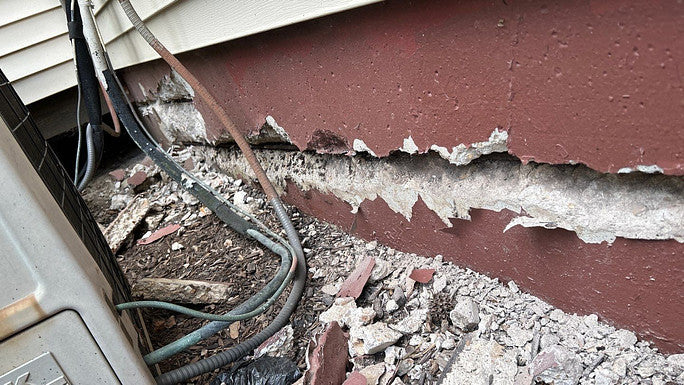 Damaged foundation wall caused by corroding rebar